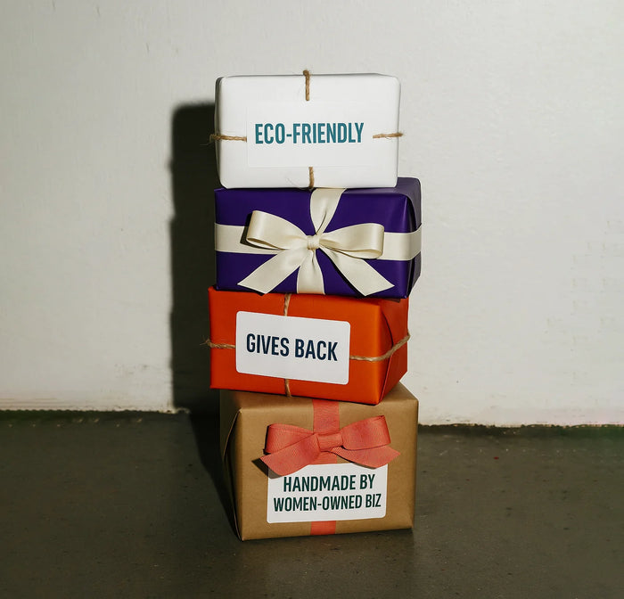 A stack of four gift boxes in different colors, each with a label describing what value they represent.