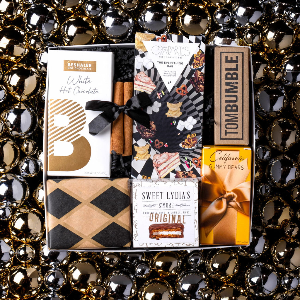Tasteful black-and-gold holiday sweets gift box.